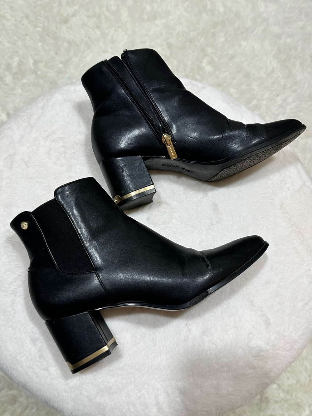 Calvin Klein Black Leather Ankle Booties with Gold Trim